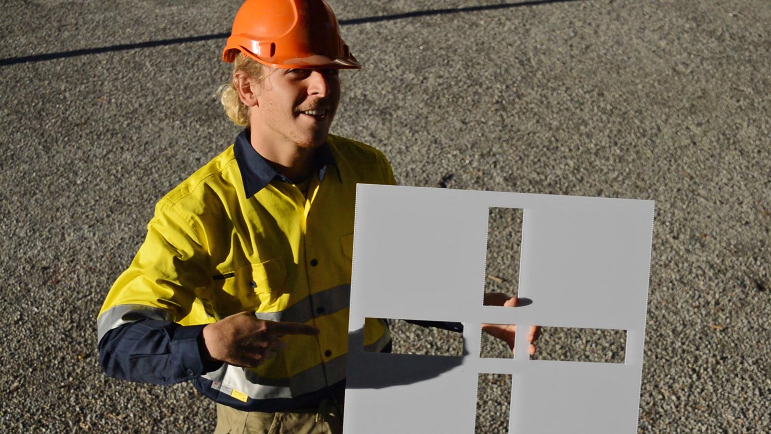 A drone pilot stood holding an Aero Stencil.