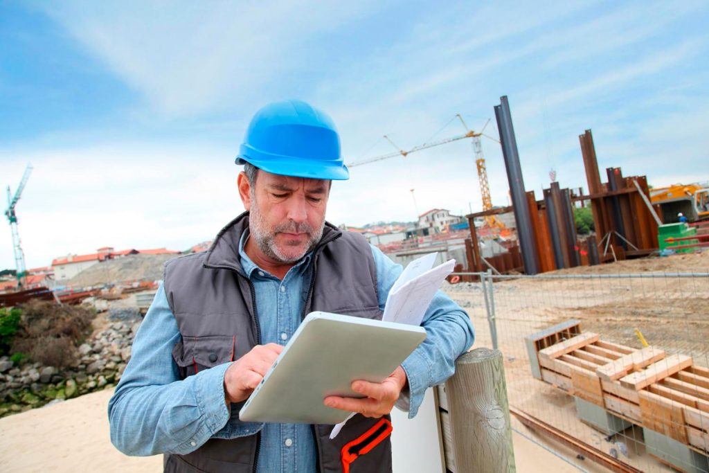 construction project manager working with drone data